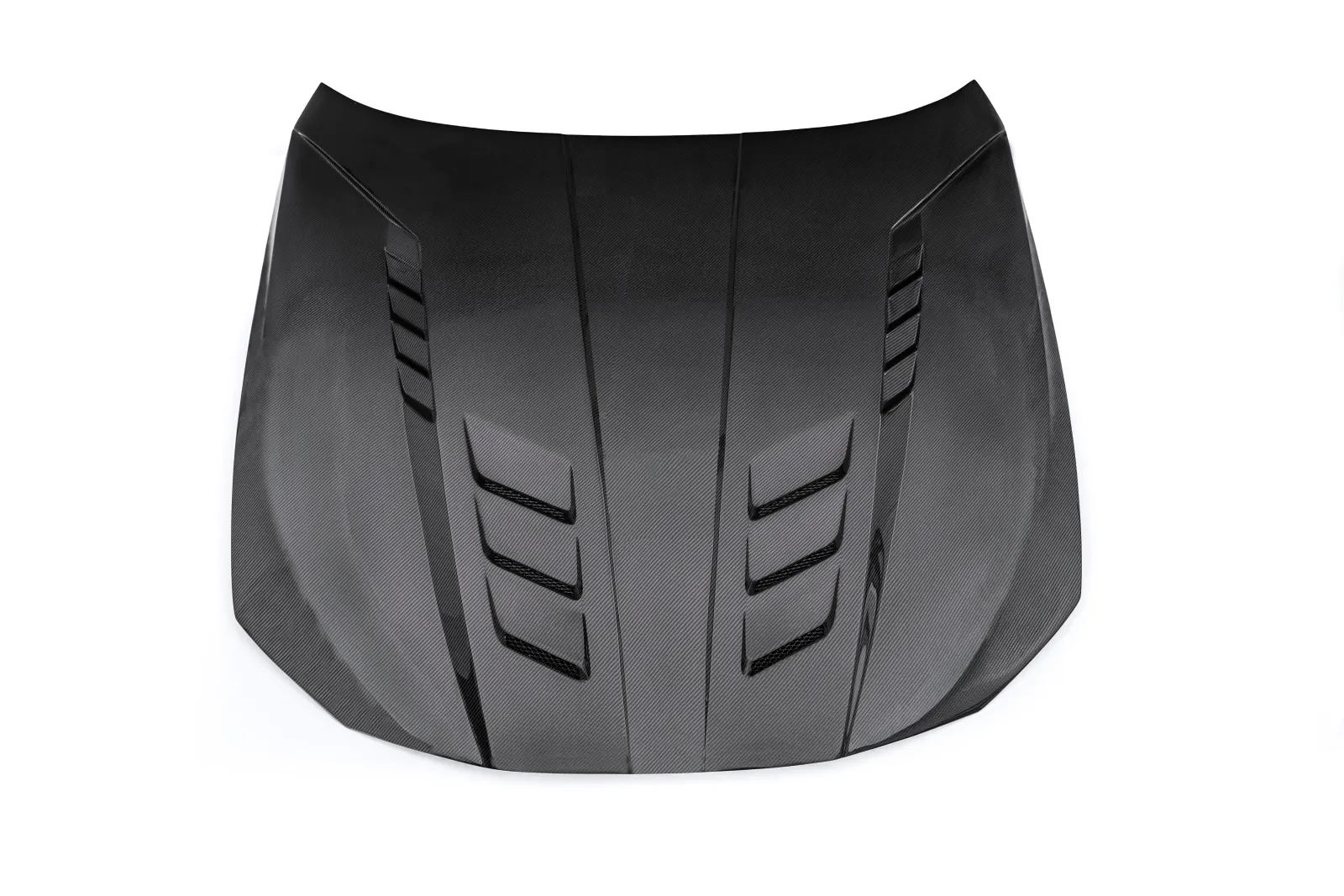 Exposed carbon fiber hood with a visible twill weave under a clear coat