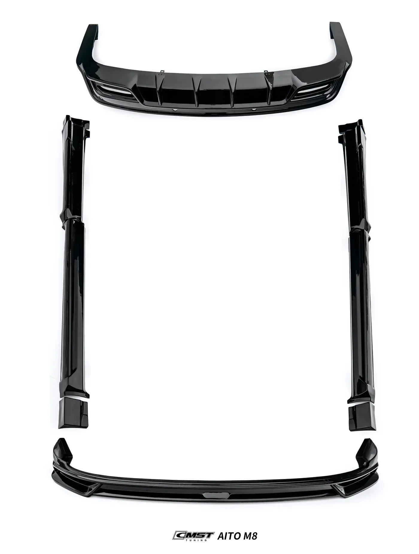 A body kit laid out on a white studio background: front lip, two side skirts and a rear diffuser